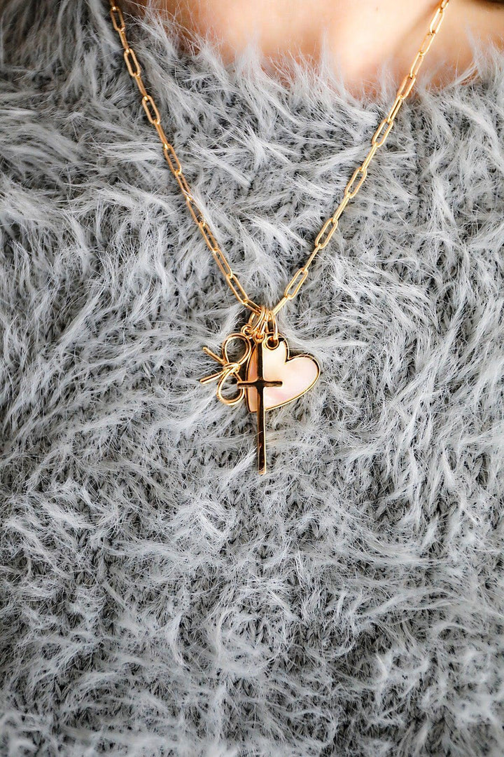 Skinny Cross Charm in Shiny Gold