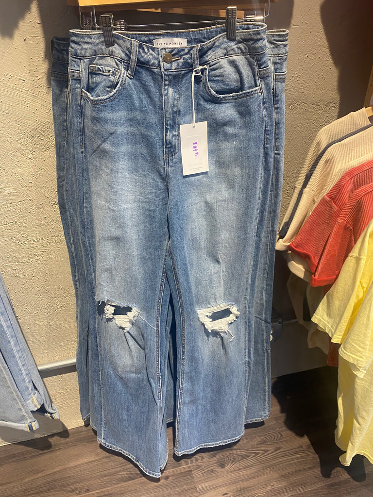 High waisted distressed jean